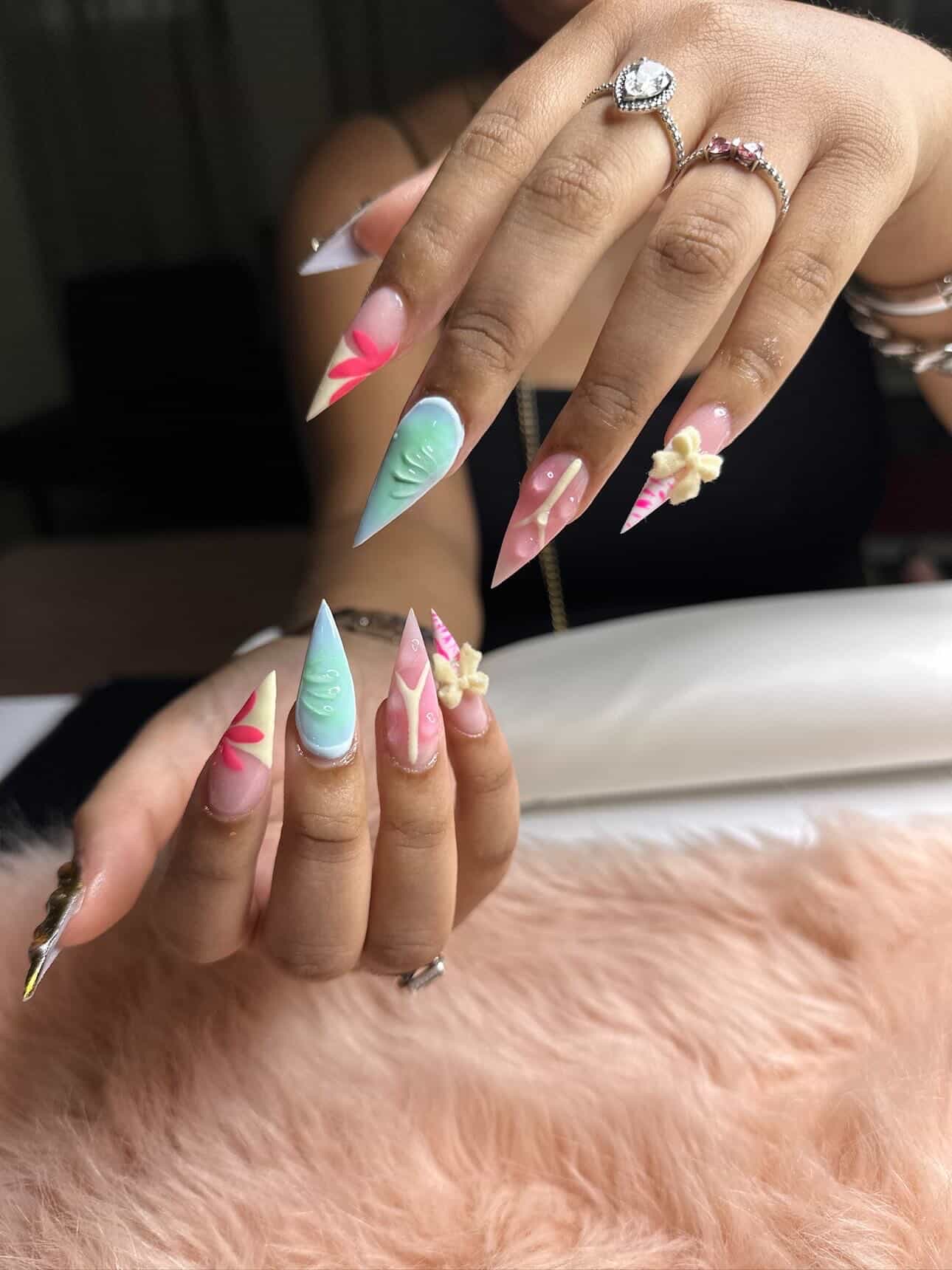 Colorful stiletto nails with 3D flowers